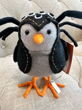 Webber from the 2023 Featherly Friends collection bird dressed as a spider!